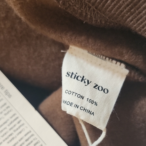 Cozy Burgundy Crew Neck Sweater with Pom-Pom Bear Details - Picture 3 of 8